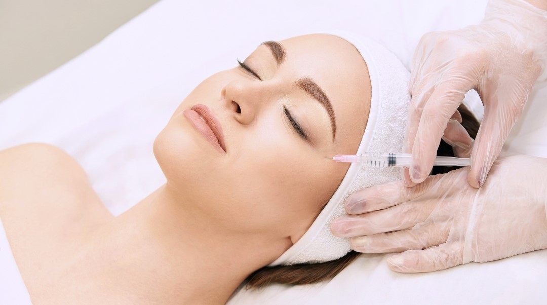 woman receiving rejuran treatment