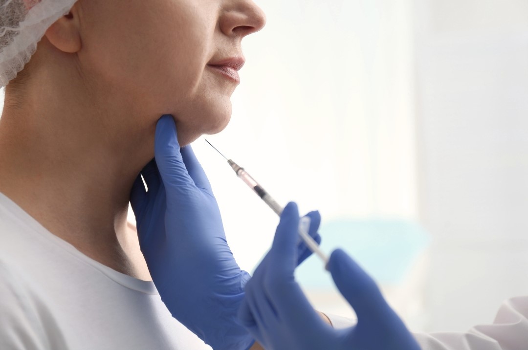 woman undergoing rejuran treatment procedure