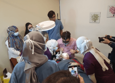 dr kim doing a demonstration during rejuran training seminar