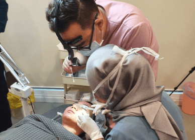 dr kim undergoing a rejuran training with a student