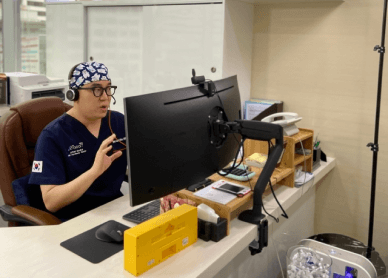 dr kim having a live discussion on webcam for i-swam virtual conference