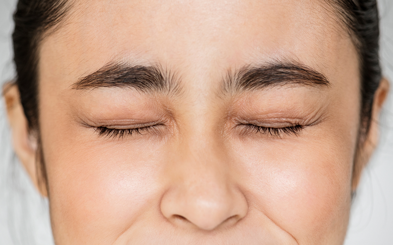 Close-up of eyes showing visible crow's feet fine lines.